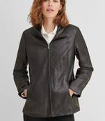 Women’s black trench style leather coat zip detail