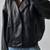 Women’s black lambskin leather jacket- bomber detail  biker stylish look