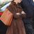 Women’s dark brown suede trench style leather coat