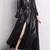 Women’s black mid-length trench style leather coat
