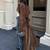 Women’s brown suede belted full-length safari-inspired leather trench coat