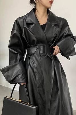 Women’s avant-garde longline black leather trench coat oversized silhouette 1