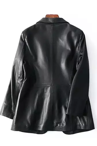 Women’s black leather trench style coat button style