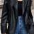 Women’s trench style black mid-length leather coat