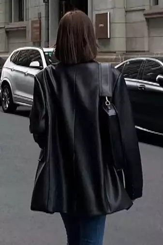 Women’s trench style black mid-length leather coat
