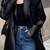 Women’s trench style black mid-length leather coat
