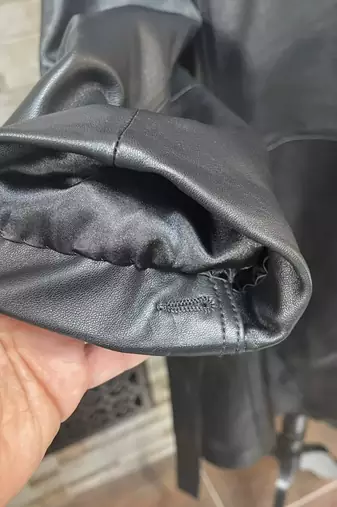 Women’s belted trench style black mid-length leather  coat