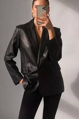 Women’s  style black mid-length leather trench coat oversized 1