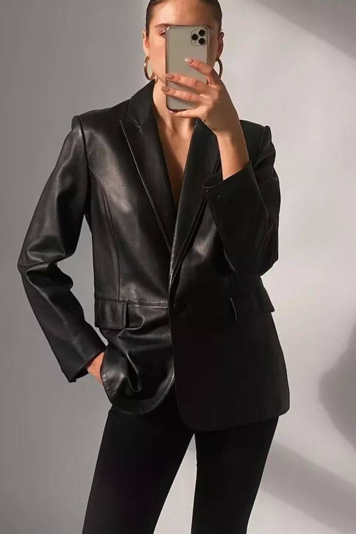 Women’s  style black mid-length leather trench coat oversized