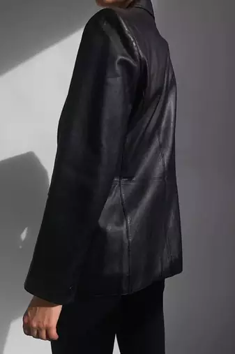 Women’s  style black mid-length leather trench coat oversized