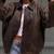 Vintage-inspired oversized women's leather bomber jacket distressed dark brown
