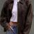 Vintage-inspired oversized women's leather bomber jacket distressed dark brown