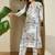 Women White Printed Regular V-Neck A-Line Pure Cotton Kurta Sets