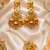Orange leaf work earrings tikka set