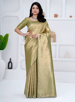 Royal pista green colour  all over woven zari tissue silk party wear saree with blouse 1