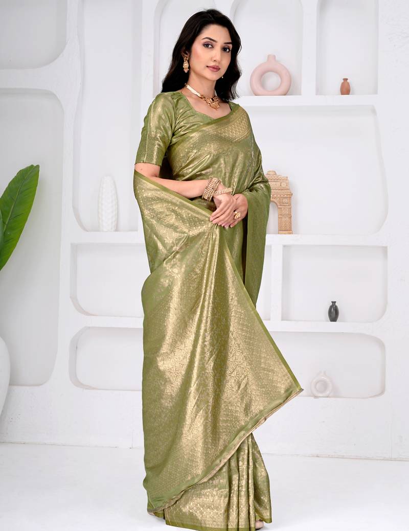 Royal pista green colour  all over woven zari tissue silk party wear saree with blouse