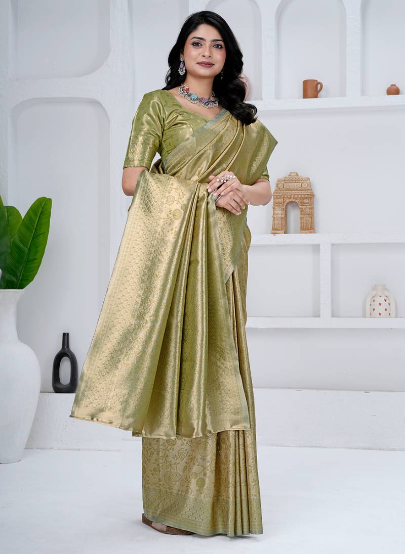 Royal pista green colour  all over woven zari tissue silk party wear saree with blouse
