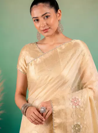 Cream Embroidery Beats Sequin Floral Work And Lightweight Tissue Linen Saree With Unstitched Blouse