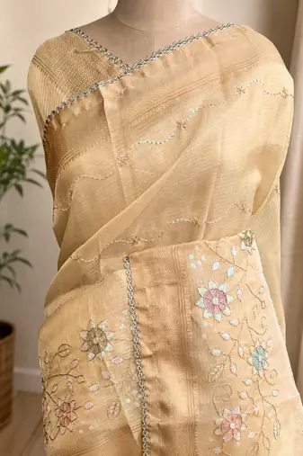 Cream Embroidery Beats Sequin Floral Work And Lightweight Tissue Linen Saree With Unstitched Blouse