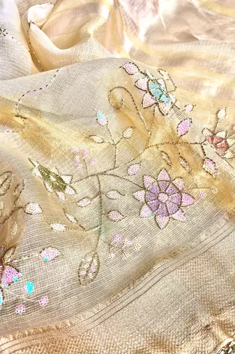 Cream Embroidery Beats Sequin Floral Work And Lightweight Tissue Linen Saree With Unstitched Blouse