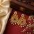 South indian gold plated peacock chandbali earrings with ruby, green stone & pearls