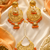 Orange beaded gold earring tikka set