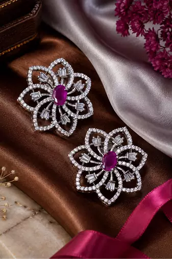 Rhodium finish ruby floral earrings