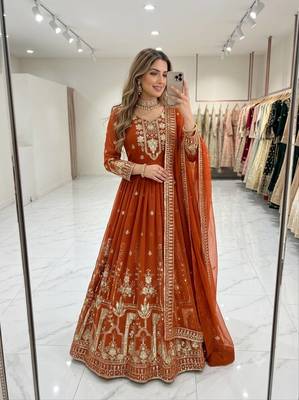orange color embroidery sequin work faux georgette gown set 1