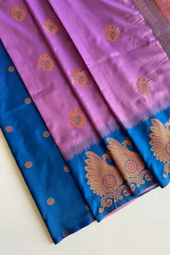 lavender color zari weaves motifs in border and contrast pallu and designer chaap border silk blend saree