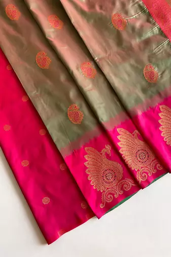 olive green color zari weaves motifs in border and contrast pallu and designer chaap border silk blend saree
