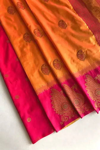 orange color zari weaves motifs in border and contrast pallu and designer chaap border silk blend saree