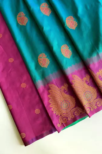 green color zari weaves motifs in border and contrast pallu and designer chaap border silk blend saree