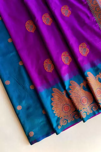 violet color zari weaves motifs in border and contrast pallu and designer chaap border silk blend saree