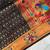 black color rich weaved pallu along polka design zari silk blend saree