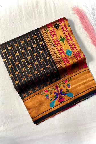 black color rich weaved pallu along polka design zari silk blend saree