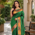 emerald green color rich weaved pallu along polka design zari silk blend saree