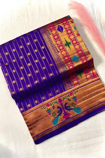 purple color rich weaved pallu along polka design zari silk blend saree