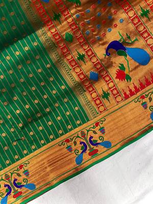 green color rich weaved pallu along polka design zari silk blend saree 3