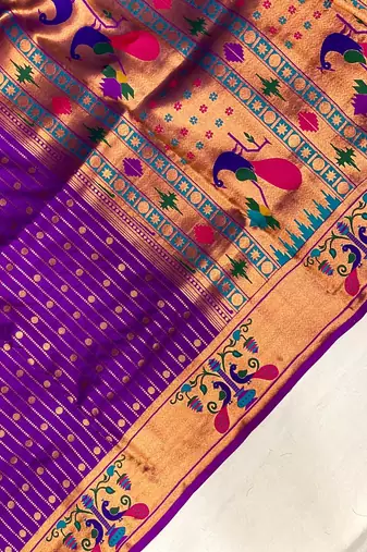 violet color rich weaved pallu along polka design zari silk blend saree