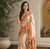 white color rich weaved pallu along polka design zari silk blend saree