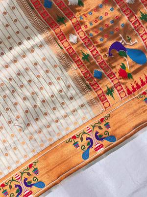 white color rich weaved pallu along polka design zari silk blend saree 3