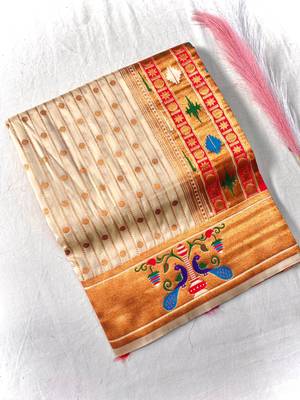 white color rich weaved pallu along polka design zari silk blend saree 4