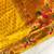 yellow color rich weaved pallu along polka design zari silk blend saree
