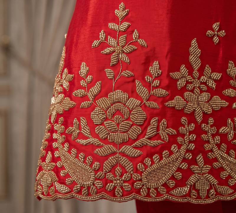 Red premium chinnon beads work suit set
