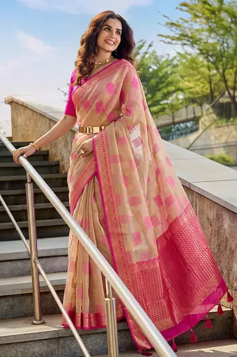 Beige designer woven saree with matching blouse