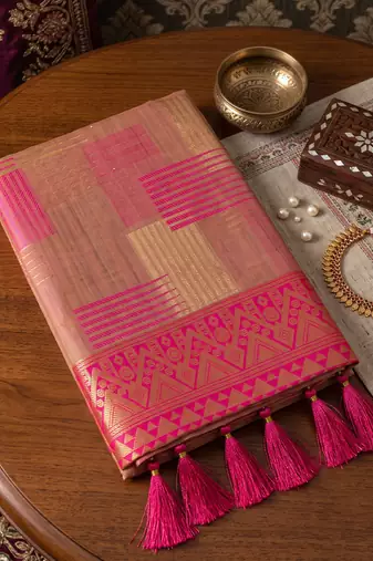 Beige designer woven saree with matching blouse