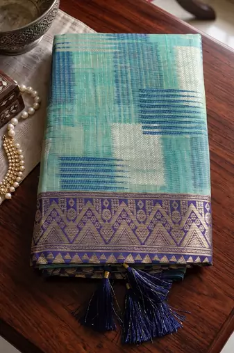 Sky blue designer woven saree with matching blouse