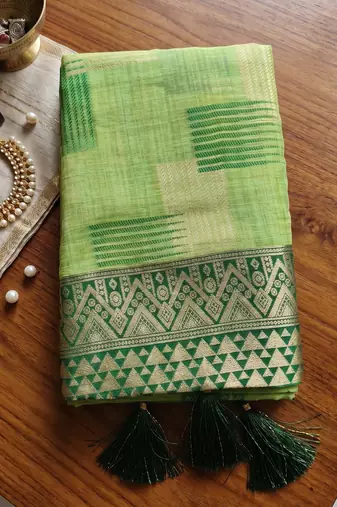 Light green designer woven saree with matching blouse