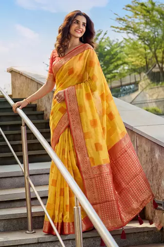 Yellow designer woven saree with matching blouse