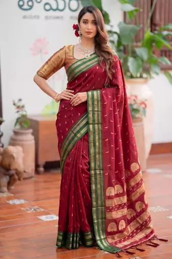 Maroon premium soft silk blend designer saree with zari motifs & rich border